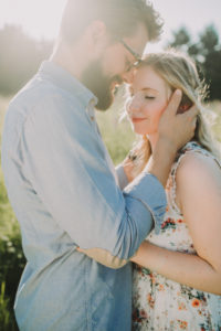 Couple in love in a meadow, laughing, happy, summer, Couple in love in a meadow, laughing, happy, summer,